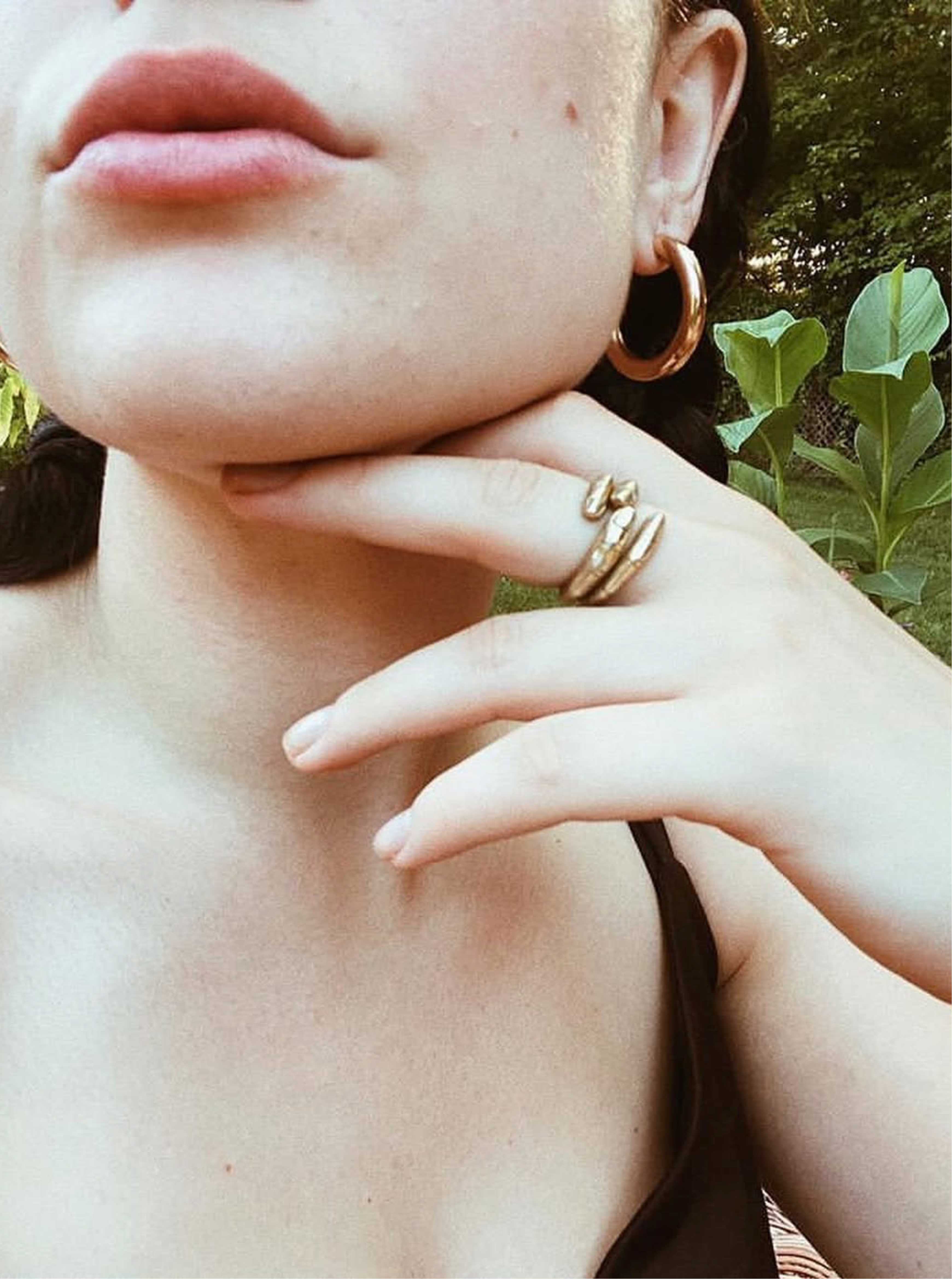 Model wearing Dirty Pineapple Finger Ring in gold