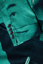 Close up of blazer with body patchwork design in green