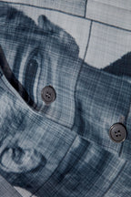 Close up of blazer with body patchwork design in grey