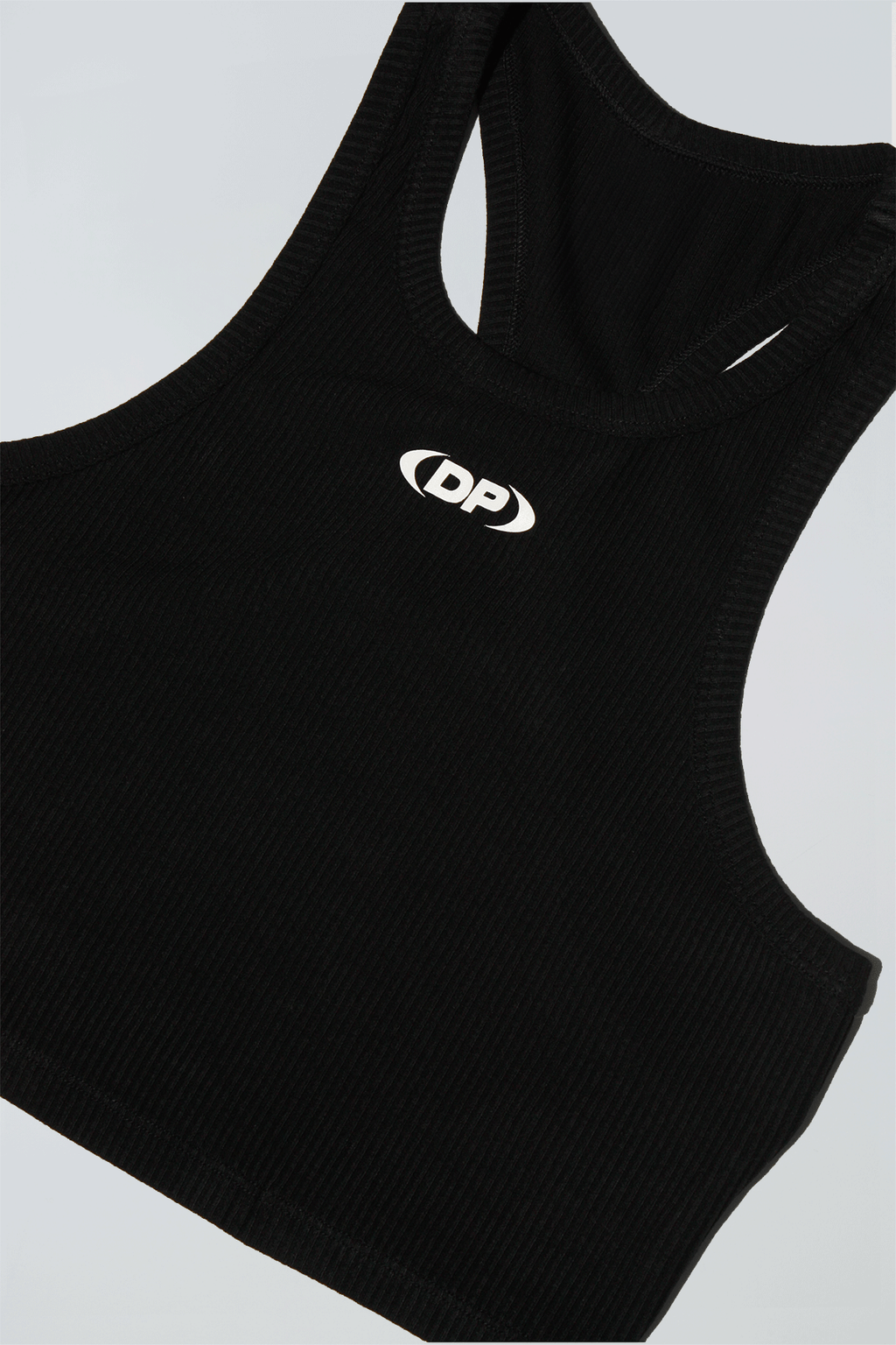 Black tank top with a logo on a light gray background
