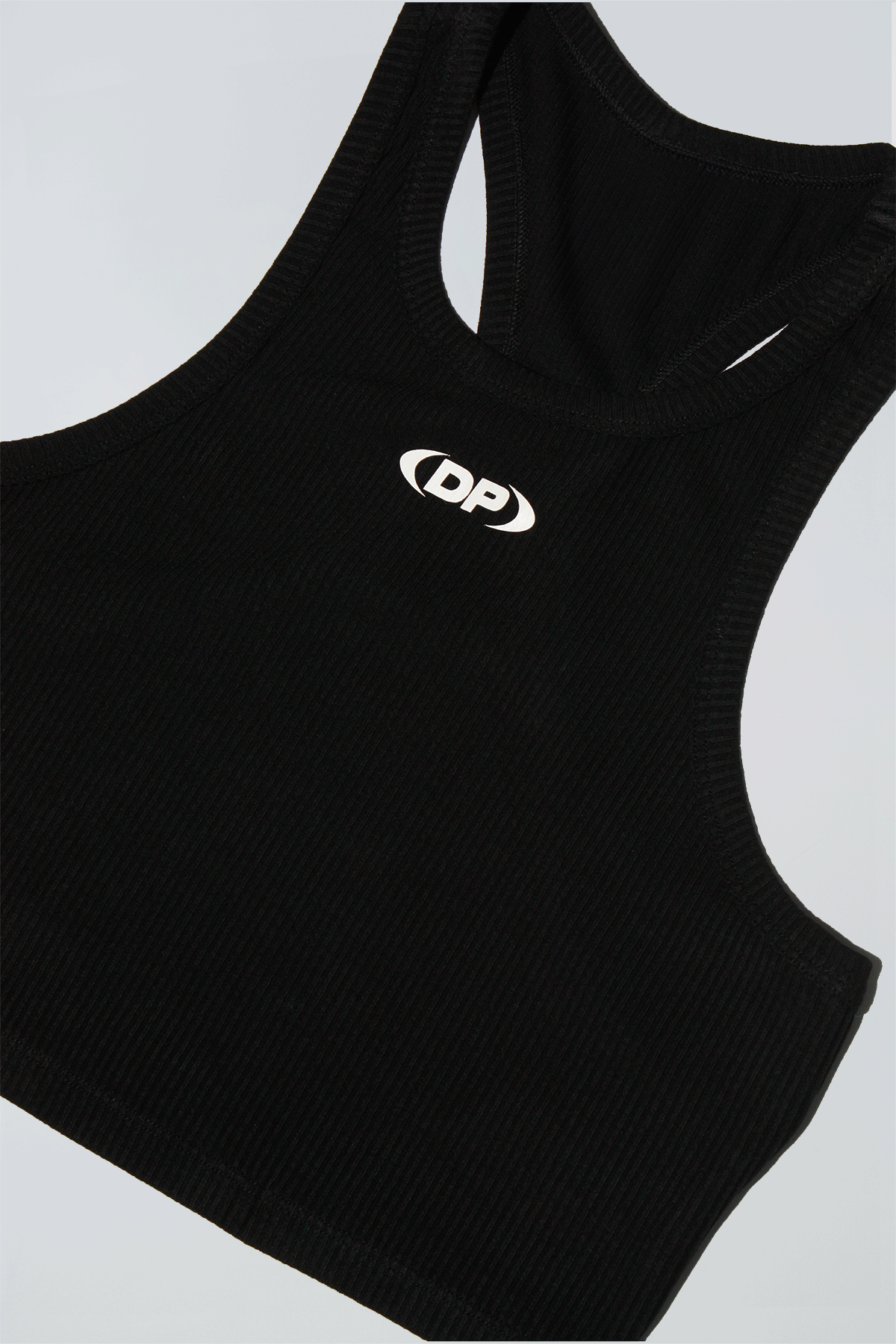 Black tank top with a logo on a light gray background