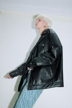 Model wearing Dirty Pineapple leather biker jacket over white background