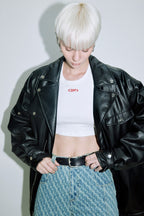 Model wearing Dirty Pineapple leather biker jacket over white background