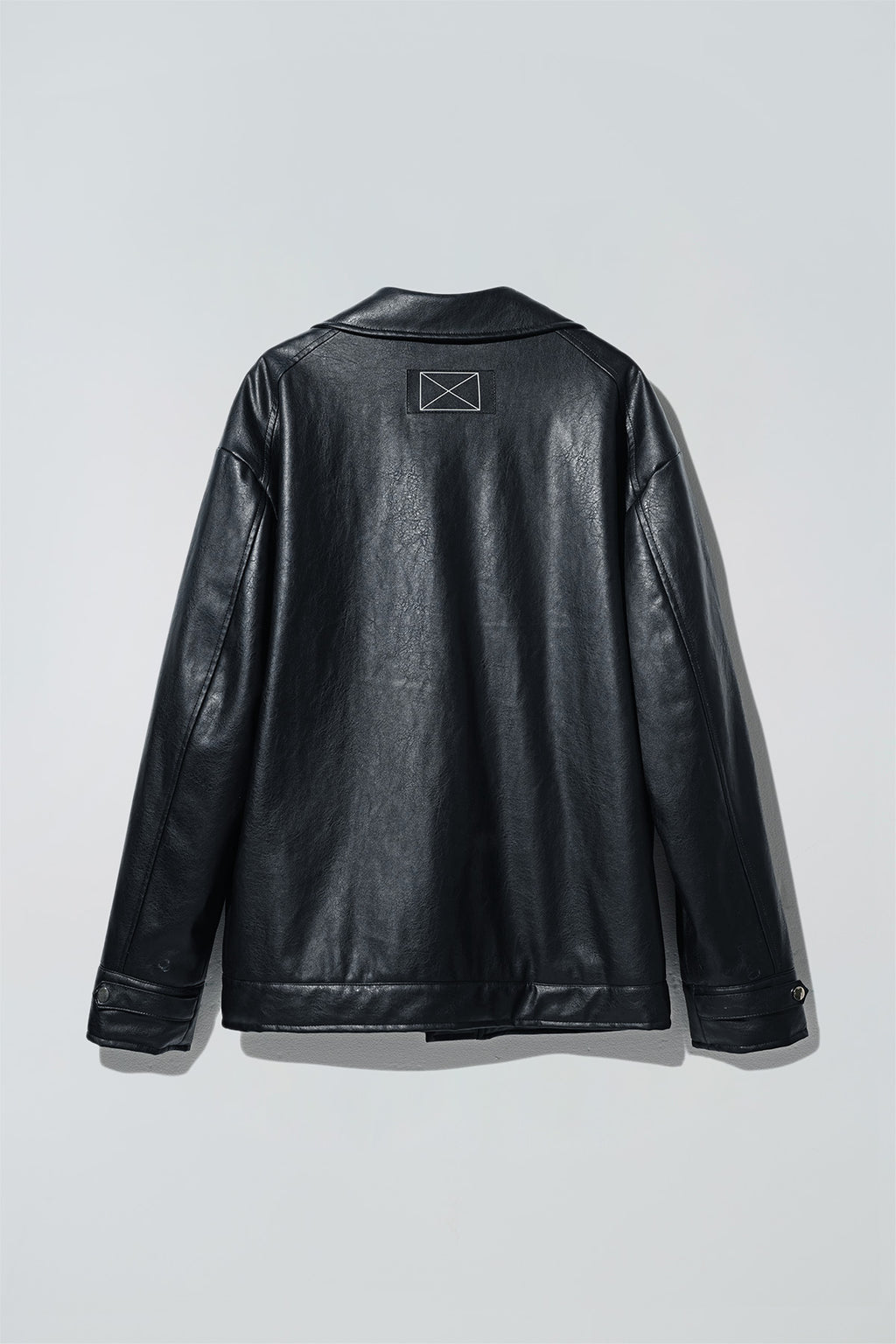 Dirty Pineapple leather biker jacket over white background