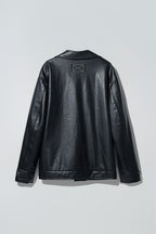 Dirty Pineapple leather biker jacket over white background