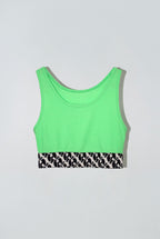 Neon green crop tank top with a black and white patterned band at the bottom